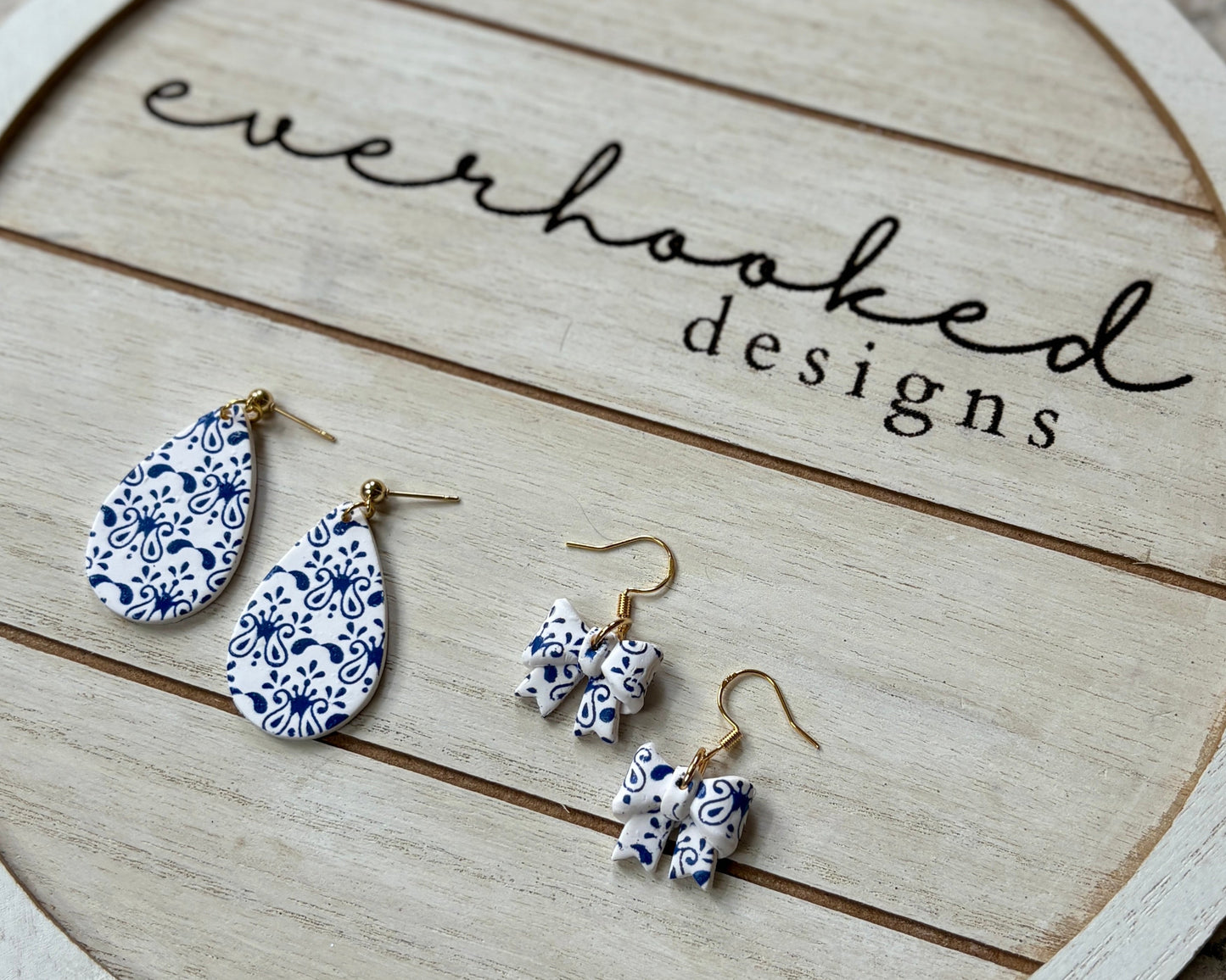 Blue and White Chinoiserie Teardrop and Bow Clay Earrings with Gold Hardware