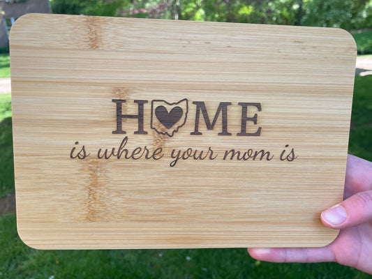 Home is where your mom is bamboo cutting board with state of Ohio as the O