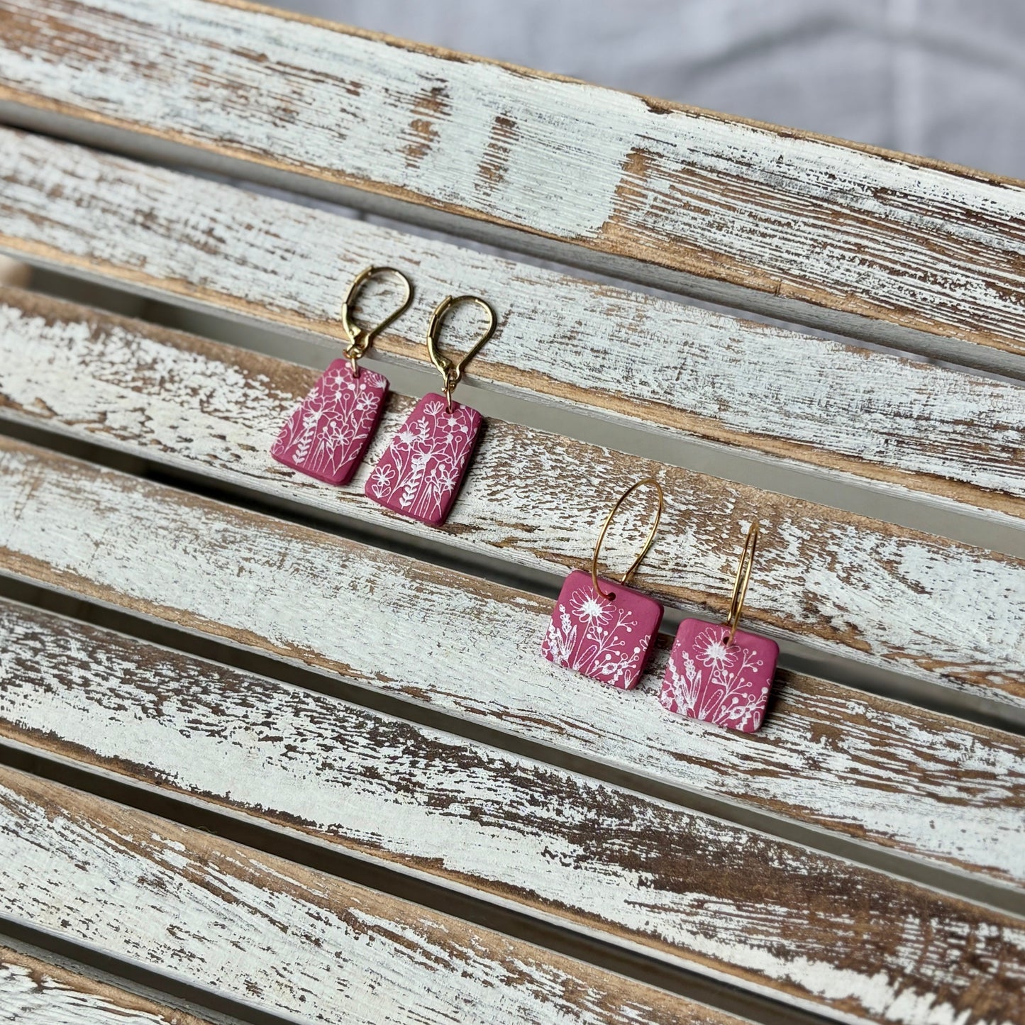 Pink dangles with white wildflowers and gold dangles